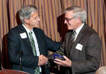 George Heartwell receiving the Sylvia Kaufman Interfaith Leadership Award from Greg Kaufman in 2016